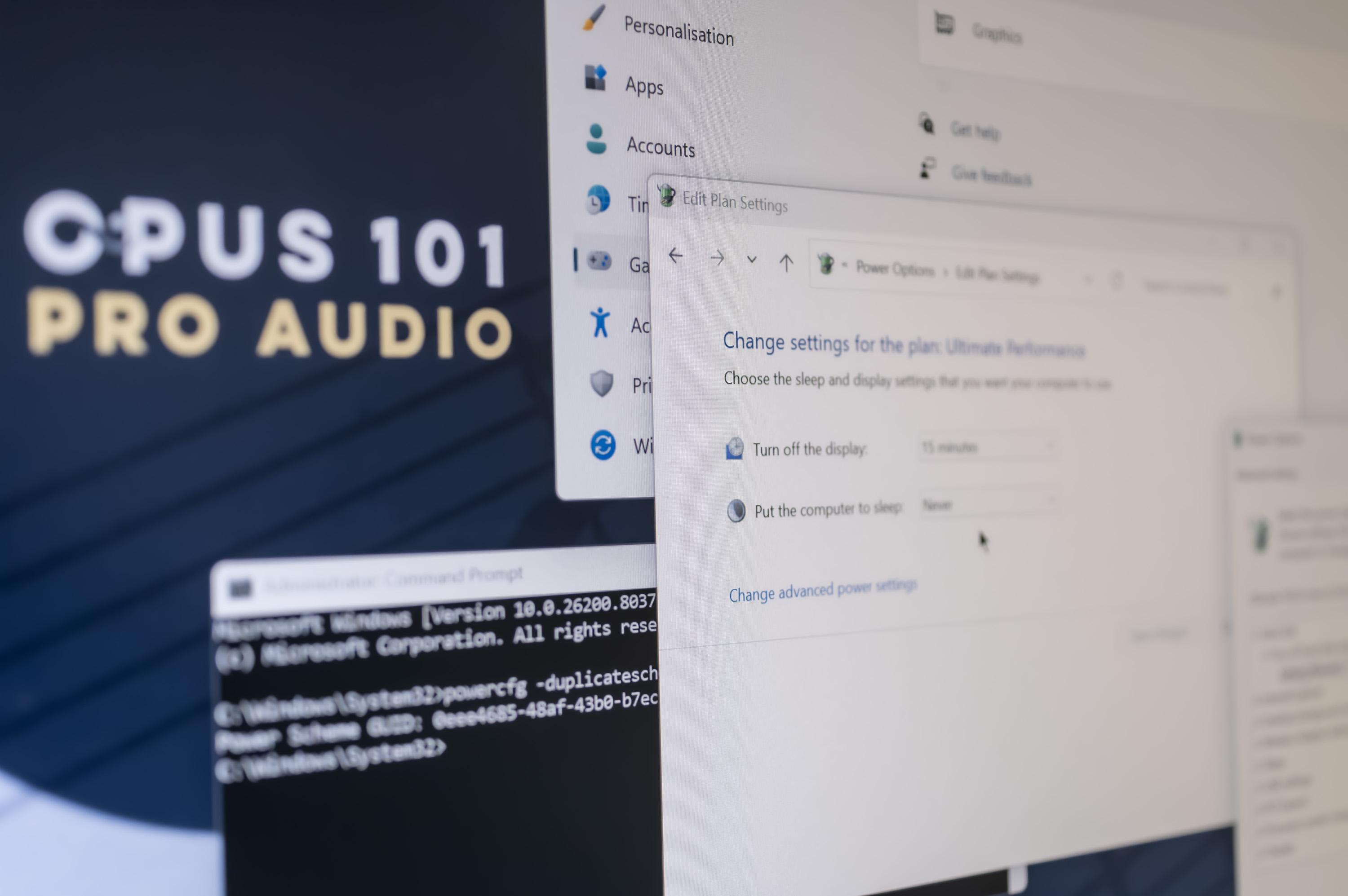 Windows Power Options showing the Ultimate Performance plan settings, with a Command Prompt window displaying the powercfg command and the OPUS 101 Pro Audio logo visible on the desktop wallpaper